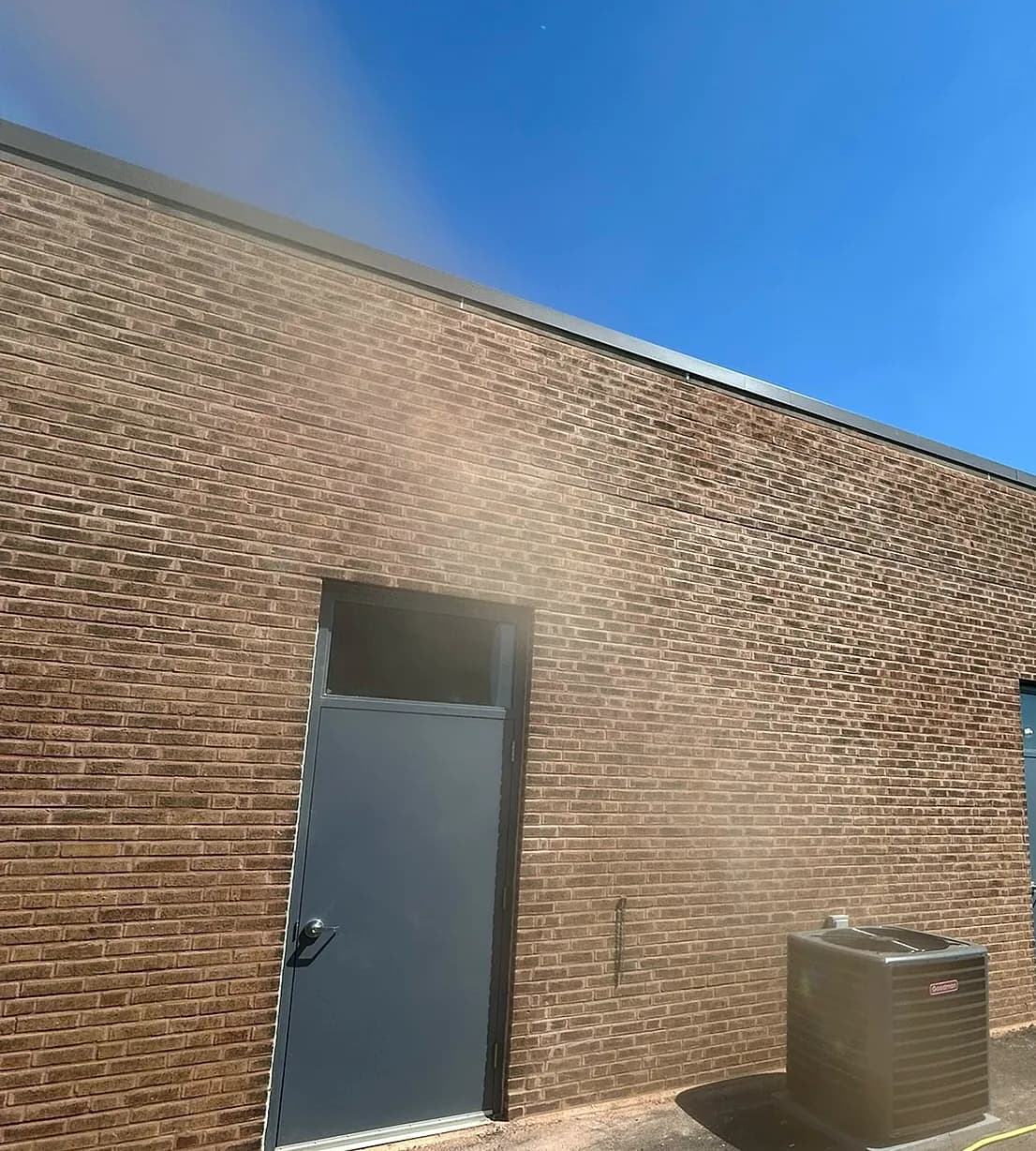 Newly laid commercial brick wall on a Chicagoland light-industrial building